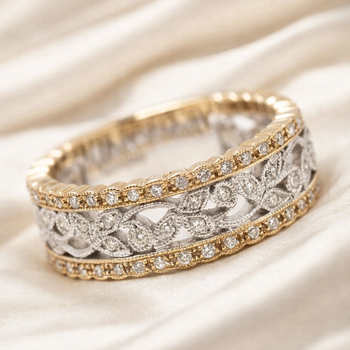 Hollow ring with diamonds in gold and antique silver